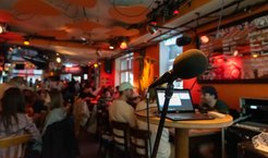 Microphone, a pub in the background